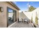 This patio is perfect for lounging and features a sliding door for easy indoor-outdoor living at 718 E Tuckey Ln, Phoenix, AZ 85014