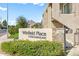 Welcoming community sign, and neatly trimmed greenery at 7436 E Chaparral Rd # B103, Scottsdale, AZ 85250