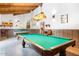 Well-lit game room featuring multiple pool tables and comfortable seating at 7436 E Chaparral Rd # B103, Scottsdale, AZ 85250