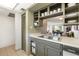 Efficient kitchen layout featuring a sink, dishwasher, and cabinets for storage at 7436 E Chaparral Rd # B103, Scottsdale, AZ 85250