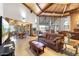 Inviting living room with vaulted wood ceilings, tile flooring, and comfortable leather seating at 7436 E Chaparral Rd # B103, Scottsdale, AZ 85250