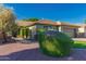 Well-maintained single-story home featuring desert landscaping, a tile roof and a two-car garage at 9212 W Salter Dr, Peoria, AZ 85382