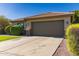 Attractive single-story home with a two-car garage and desert landscaping at 9212 W Salter Dr, Peoria, AZ 85382