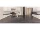 Modern kitchen with stainless steel appliances, a gas cooktop and a large island at 9212 W Salter Dr, Peoria, AZ 85382