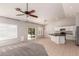 Bright, open-concept living space with vaulted ceilings and an eat-in kitchen at 9212 W Salter Dr, Peoria, AZ 85382