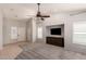 Inviting living room with high ceilings, tile flooring, and plantation shutters at 9212 W Salter Dr, Peoria, AZ 85382