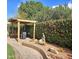 Backyard area featuring a covered grill and desert landscaping at 9445 N 106Th St, Scottsdale, AZ 85258