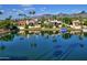 Scenic lake view showcasing waterfront homes and community landscaping at 9445 N 106Th St, Scottsdale, AZ 85258