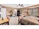 Bright and airy bedroom with exercise equipment at 11023 E Florian Ave, Mesa, AZ 85208