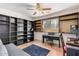This bright bedroom features a large bookcase and an electric piano at 11023 E Florian Ave, Mesa, AZ 85208