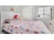 Bedroom with a closet, plush bed and an expansive window at 11813 W Sierra St, El Mirage, AZ 85335