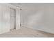 Bedroom featuring a carpeted floor, a window, and a closet at 12378 W Marguerite Ave, Avondale, AZ 85323
