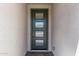 Stylish green front door with glass panels offers a welcoming entrance at 12378 W Marguerite Ave, Avondale, AZ 85323