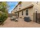 Backyard with a charming brick patio, dining table, perfect for outdoor entertaining at 1265 S Aaron -- # 355, Mesa, AZ 85209