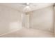 A clean, carpeted bedroom featuring a ceiling fan and neutral-colored walls at 1265 S Aaron -- # 355, Mesa, AZ 85209