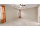 Spacious bedroom with a ceiling fan and a large window, offering a bright and airy feel at 1265 S Aaron -- # 355, Mesa, AZ 85209
