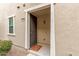 Close up of front door with desert landscaping, security door and address numbers at 1265 S Aaron -- # 355, Mesa, AZ 85209