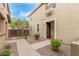 Front entrance featuring desert landscaping, walkway, and security door at 1265 S Aaron -- # 355, Mesa, AZ 85209