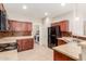 A modern kitchen featuring stainless steel appliances, ample cabinet space, and tile flooring at 1265 S Aaron -- # 355, Mesa, AZ 85209