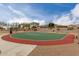 Community basketball court with trash receptacle and seating at 1312 N Joplin Cir, Mesa, AZ 85207