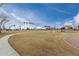 Expansive community park featuring walking path, open space, tall trees, and recreational areas for outdoor enjoyment at 1312 N Joplin Cir, Mesa, AZ 85207
