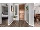 Light and bright entryway with view to the dining room and bedroom at 1312 N Joplin Cir, Mesa, AZ 85207
