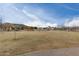 Expansive community greenspace with walking path and open area at 1312 N Joplin Cir, Mesa, AZ 85207