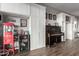 Charming recreation space featuring a popcorn machine, a piano and custom built-ins at 1312 N Joplin Cir, Mesa, AZ 85207