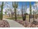 Walking path through the Saguaro Mountain Community Park with desert landscaping and green spaces at 1312 N Joplin Cir, Mesa, AZ 85207