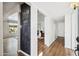 Bright hallway featuring a chalkboard wall and hardwood floors leading to the living spaces at 1940 E Montebello Ave, Phoenix, AZ 85016