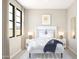 Serene bedroom with neutral colors, large windows, and a comfortable bed with stylish bedding at 20301 W Turney Ave, Buckeye, AZ 85396