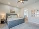 This bedroom is bright and airy with a bathroom en suite and plenty of space at 2040 W Gail Rd, Queen Creek, AZ 85142