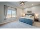 This bedroom boasts a large window and a comfy bed, perfect for rest and relaxation at 2040 W Gail Rd, Queen Creek, AZ 85142