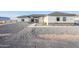 Charming single-story home featuring gray gravel landscaping and a welcoming front porch at 2040 W Gail Rd, Queen Creek, AZ 85142