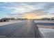 Scenic street view showcasing a peaceful neighborhood with mountain views and clear blue skies at 2040 W Gail Rd, Queen Creek, AZ 85142