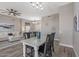 Open dining area with seamless flow to the living room, perfect for entertaining guests at 20407 N Tanglewood Dr, Sun City West, AZ 85375