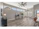 Living room with large windows and access to the outdoors at 20407 N Tanglewood Dr, Sun City West, AZ 85375