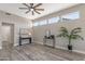 Bright living room with modern furnishings and a ceiling fan for comfort at 20407 N Tanglewood Dr, Sun City West, AZ 85375