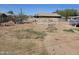 Spacious backyard with fencing, ready for landscaping and outdoor enjoyment at 2205 W Hadley St, Phoenix, AZ 85009