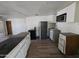 Spacious kitchen features a long island, modern appliances, and hardwood floors at 2205 W Hadley St, Phoenix, AZ 85009