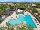 Aerial view of community pool, a luxurious amenity with various pools, tanning deck and shade cabanas at 22410 N 29Th Pl, Phoenix, AZ 85050