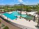 Relaxing community pool with palm trees, lounge chairs, and mountain views at 22410 N 29Th Pl, Phoenix, AZ 85050