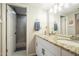 Bathroom featuring a granite vanity, a walk-in shower and chrome faucets at 2254 S Noche De Paz --, Mesa, AZ 85202