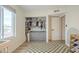 Bedroom features built-in storage, closet, and ample natural light from the window at 2254 S Noche De Paz --, Mesa, AZ 85202