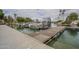 Community boat dock on a scenic lake, featuring multiple boat slips and waterfront access at 2254 S Noche De Paz --, Mesa, AZ 85202