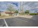 The community pool includes a recreation center and an enclosed area with palm trees and landscaping at 2254 S Noche De Paz --, Mesa, AZ 85202