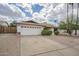 Charming single-story home featuring a two-car garage, tidy landscaping, and a welcoming facade at 2254 S Noche De Paz --, Mesa, AZ 85202