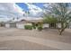 Inviting home with a 2-car garage, xeriscaped yard, and well-manicured landscaping at 2254 S Noche De Paz --, Mesa, AZ 85202