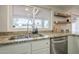 The kitchen sink area features a window view to the outside at 2254 S Noche De Paz --, Mesa, AZ 85202