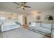 Bright and airy living room with modern decor, hardwood floors, and comfortable seating at 2254 S Noche De Paz --, Mesa, AZ 85202